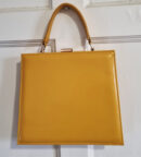 Custard yellow patent top handle bag